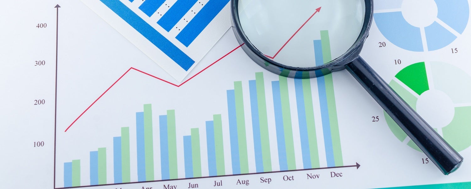 graphs-charts-magnifying-glass