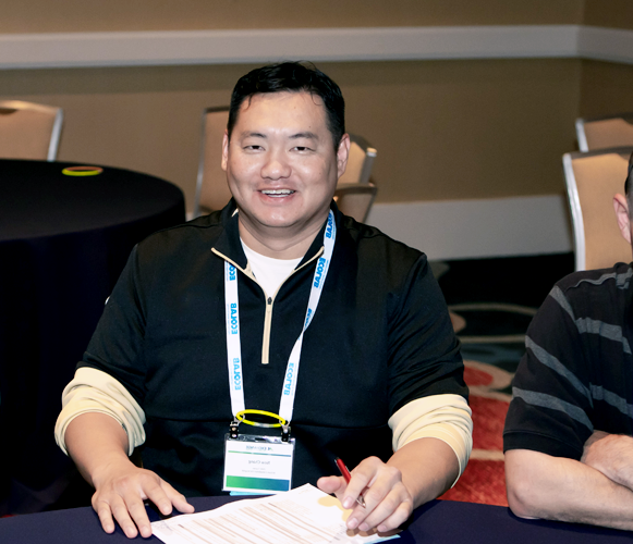 AHE member sitting at a table