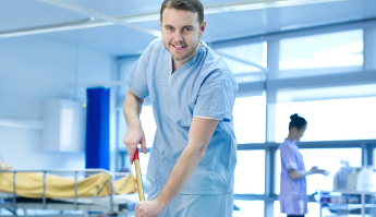 Man mopping the floor