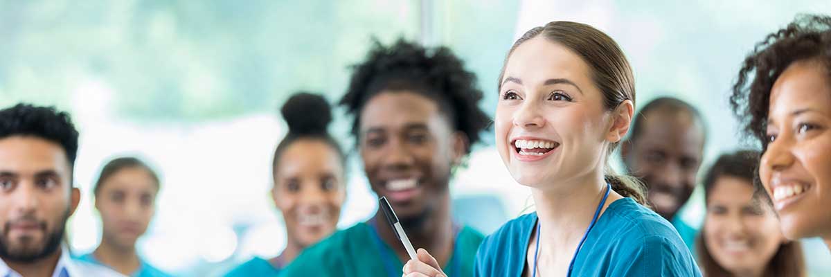 Medical staff meeting in a classroom. 