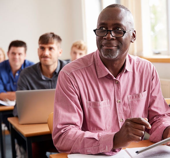 man learning in classroom